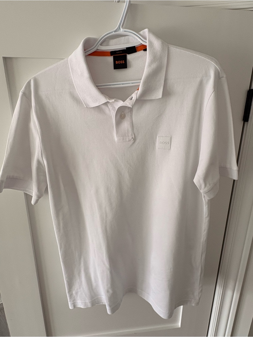 BOSS White Polo Shirt with Subtle Orange Trim